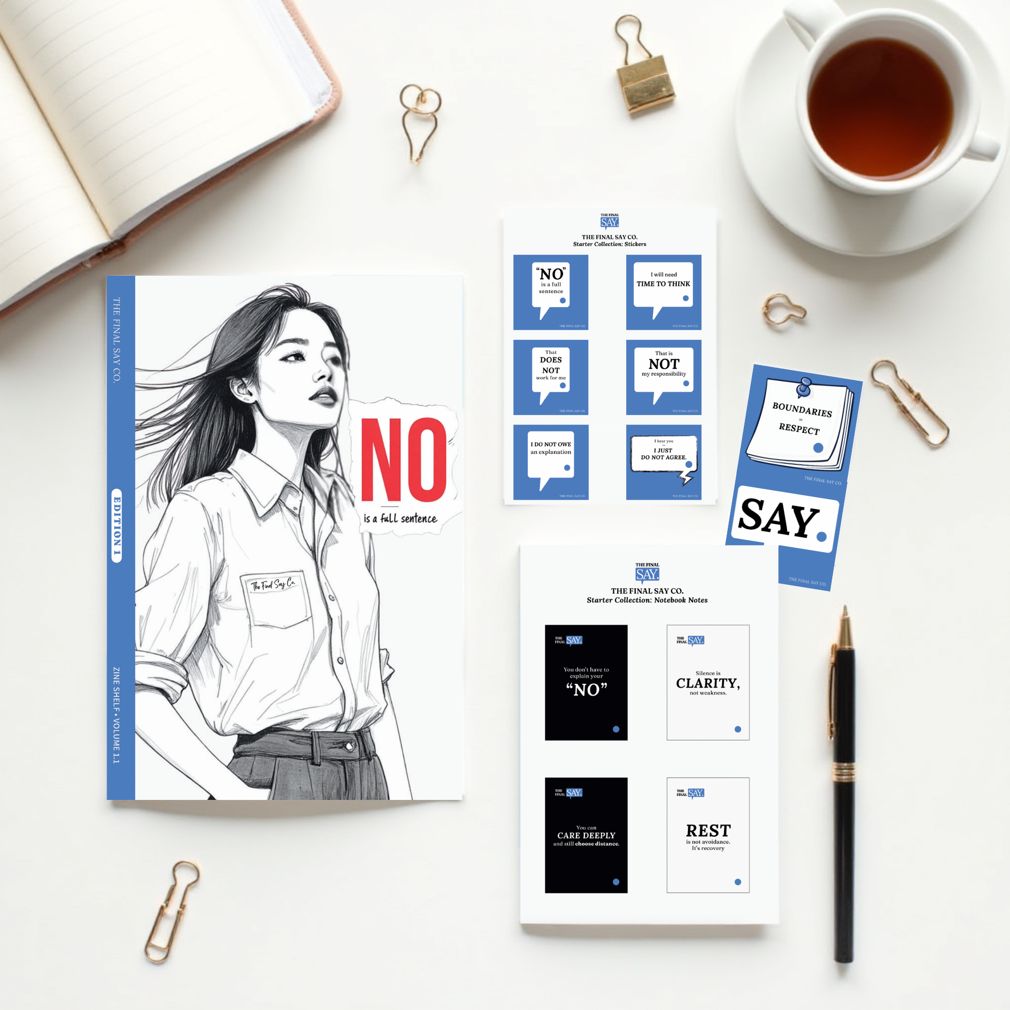 Flat lay of The Final Say Co. “No Is a Full Sentence” zine, sticker sheets, and notebook notes beside tea and stationery on a white desk.